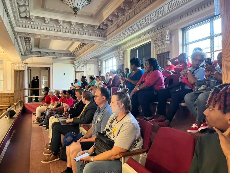 GCAE members attend a county commission meeting